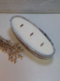 Vela artesanal en recipiente ovalado efecto mármol