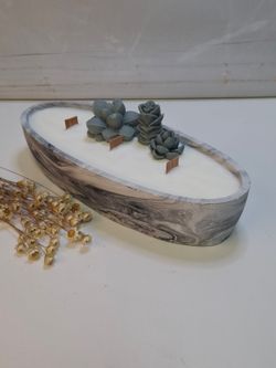 Vela artesanal en recipiente ovalado efecto mármol