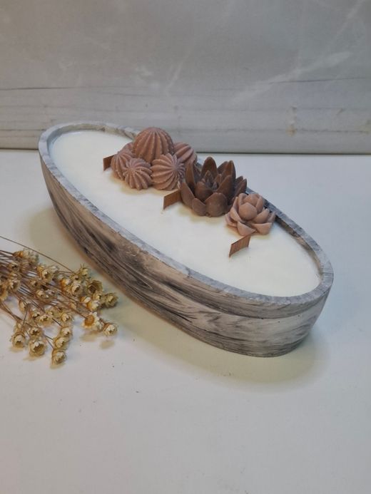 Vela artesanal en recipiente ovalado efecto mármol