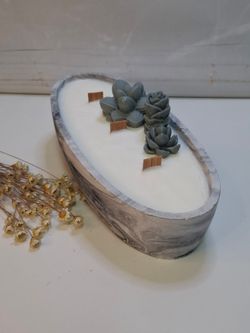 Vela artesanal en recipiente ovalado efecto mármol