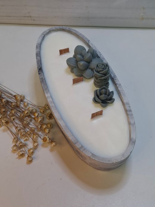 Vela artesanal en recipiente ovalado efecto mármol