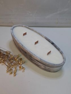 Vela artesanal en recipiente ovalado efecto mármol