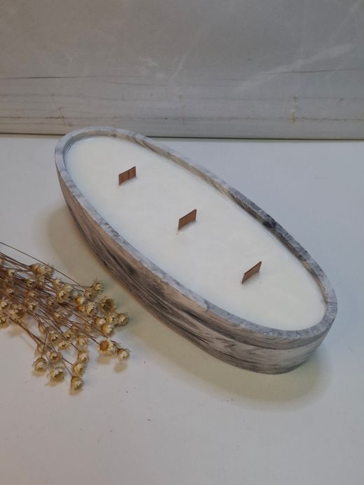 Vela artesanal en recipiente ovalado efecto mármol