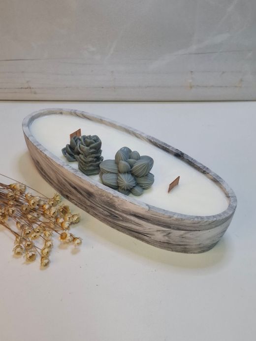 Vela artesanal en recipiente ovalado efecto mármol