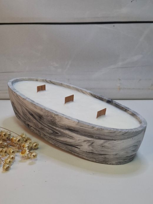Vela artesanal en recipiente ovalado efecto mármol