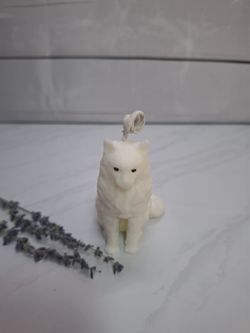 Vela decorativa artesanal con forma de gato blanco