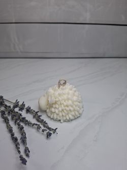 Vela decorativa con forma de oveja blanco