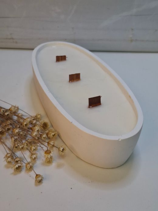 Vela artesanal Ovalada blanca con Mechas de Madera  | Luz de Candle