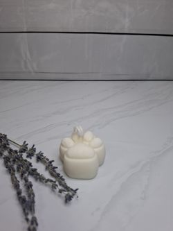 Vela decorativa con forma de huella de animal